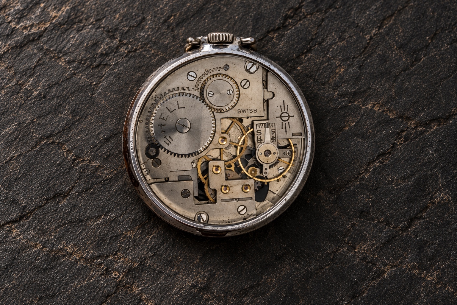 Rear view of the inherited pocket watch, showing its mechanical movement